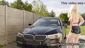 Busty bikini hottie gets titty fucked at car wash