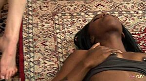 Girl on girl action in the living room
