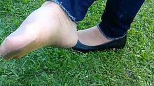 Detailed shoeplay and dipping featuring tan nylons and flats in see-through leggings