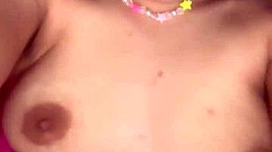 This petite 18-year-old slut, Tiny, masturbates just for your fun