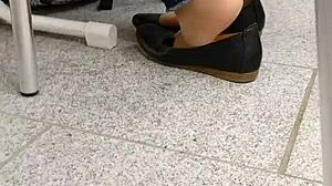 Detailed shoeplay and dipping featuring tan nylons and flats in see-through leggings