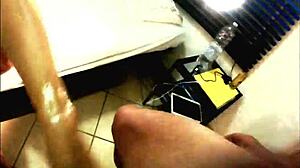 Ball busting session ends with cum on feet. Amateur femdom mistress delivers pain and handjob in bondage.