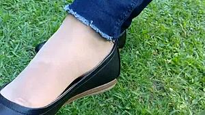 Detailed shoeplay and dipping featuring tan nylons and flats in see-through leggings