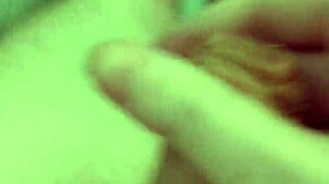 The sweet pleasure of relaxing masturbation, lying on the bed naked