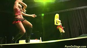 Cock sharing on public sex fair show stage