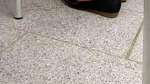 Shoeplay and dipping in action with tan nylons and flats