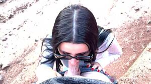 Skinny Girl In Glasses Gives Outdoor Blowjob