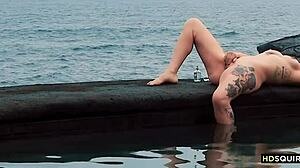 A girl acted like a crazy cat by the sea and it was awesome
