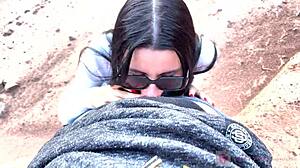 Skinny Girl In Glasses Gives Outdoor Blowjob