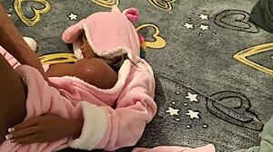 Doll in a pink robe as a unicorn is fucked from above