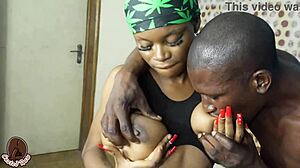 Naija beauty with big black boobs rides a thick fat cock for intense pleasure