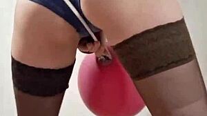 A hot mistress with sexy balloons, Elza Kom’s captivating show