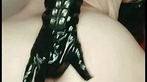 Redhead vintage whore indulges in solo leather pleasure
