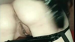 Redhead vintage whore indulges in solo leather pleasure
