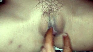 in this amateur scene, a guy fucks a beautiful shaved pussy with pink lips, making her wet and tight until orgasm