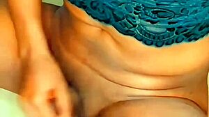 Anal sex with a caged latex femboy and a dildo