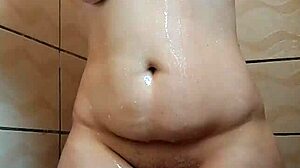 Shaving my legs and armpits while taking a shower, looking innocent
