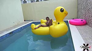 Maxine X Sunbathes In The Pool, Fingering Her Wet Pussy