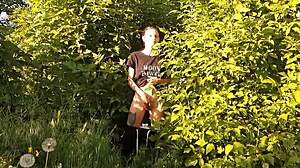 Brunette feels intense orgasm from risky outdoor masturbation in nature