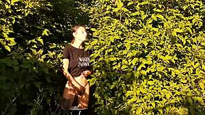 Brunette feels intense orgasm from risky outdoor masturbation in nature