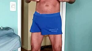 Papi fachero enjoys comfy muscle shorts at home with soft cotton on his thick dad bod