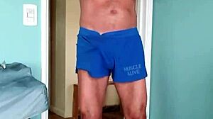 Papi fachero enjoys comfy muscle shorts at home with soft cotton on his thick dad bod