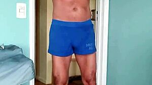 Papi fachero enjoys comfy muscle shorts at home with soft cotton on his thick dad bod