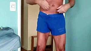 Papi fachero enjoys comfy muscle shorts at home with soft cotton on his thick dad bod