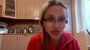 what's behind this russian mistress with long nails and glasses dominating with huge control?