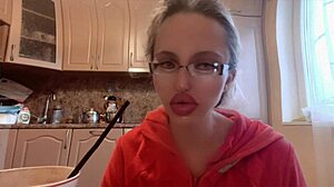 what's behind this russian mistress with long nails and glasses dominating with huge control?