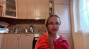 what's behind this russian mistress with long nails and glasses dominating with huge control?