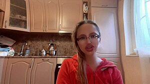 what's behind this russian mistress with long nails and glasses dominating with huge control?