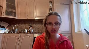 what's behind this russian mistress with long nails and glasses dominating with huge control?