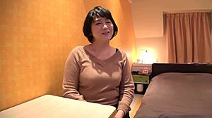 Rare clip of pregnant Japanese MILF undressing in hotel room