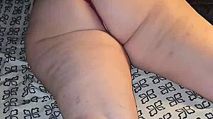 red thong teases big ass cheeks and wet pussy lips, inviting fingers to explore hidden desires