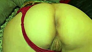 red thong teases big ass cheeks and wet pussy lips, inviting fingers to explore hidden desires