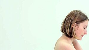 Young Teen Carefully Shaving Herself in Private Setting