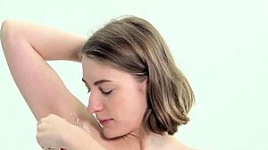 Young Teen Carefully Shaving Herself in Private Setting