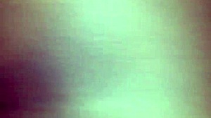 Wet creamy black skin glistens under the light