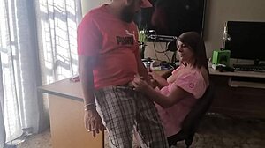 The brunette amateur plays with his cock in her dress at home, teasing with natural tits.