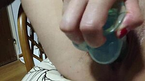 blonde with tattoo masturbates using dildo