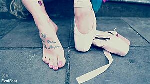 Ballerina In Ballet Shoes Walks Down Street