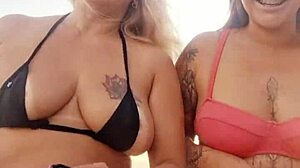 milf and friend get naughty on beach with young virgin.
