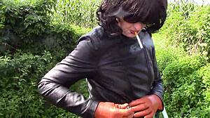 Smoking Milf in Cinnamon Leather Trousers Outdoors