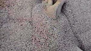 Bare feet sinking into warm beach sand