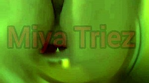 miya triez performs a strip tease with her big ass and natural tits