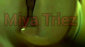 miya triez performs a strip tease with her big ass and natural tits