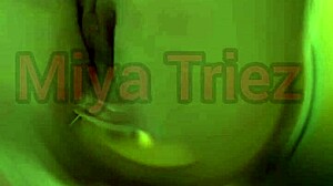 miya triez performs a strip tease with her big ass and natural tits