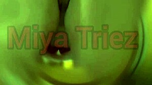 miya triez performs a strip tease with her big ass and natural tits