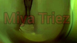 miya triez performs a strip tease with her big ass and natural tits